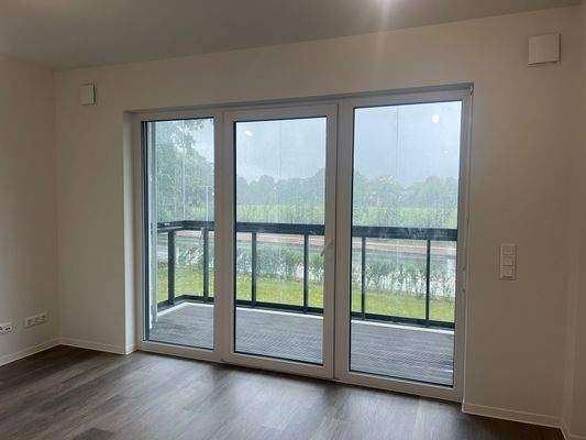 Wohnzimmer mit Balkon