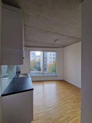 Wohnküche + Zimmer 1.jpg