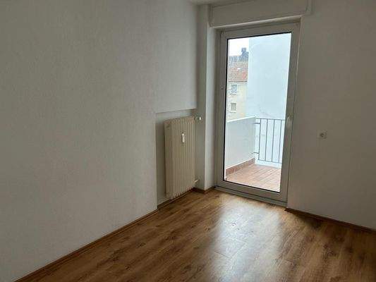 Schlafzimmer mit Balkon