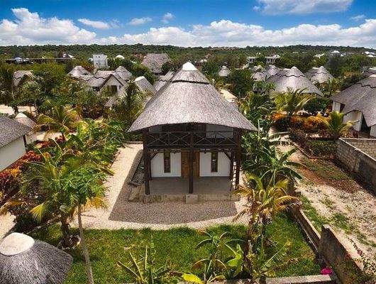 One storey beach villa in garden.jpg