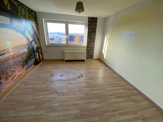 Schlafzimmer (Wohnung OG links)