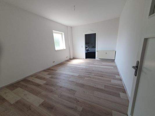 1. OG Ansicht Schlafzimmer vom Flur.jpg