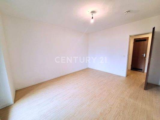 Schlafzimmer mit Zugang zum Balkon