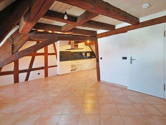 Wohnzimmer mit angrenzender Küche