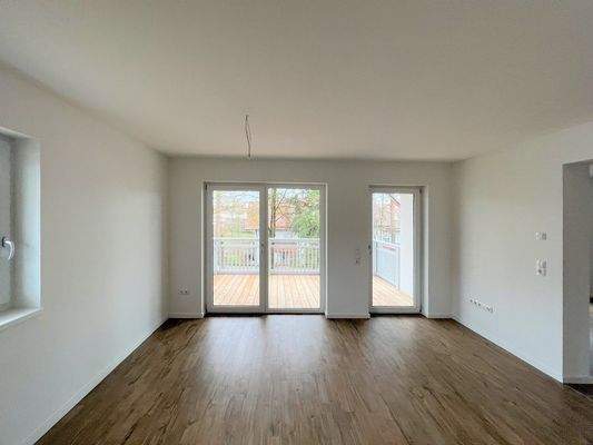 Lichtdurchfluteter Wohn(t)raum mit Balkonzugang - Moderne Architektur zum Wohlfühlen!