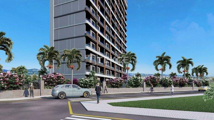 New Apartments in Mersin with a Pool and Modern Landscaping