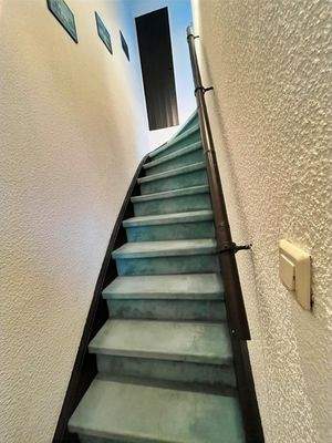 Aufgang in das Dachgeschoss