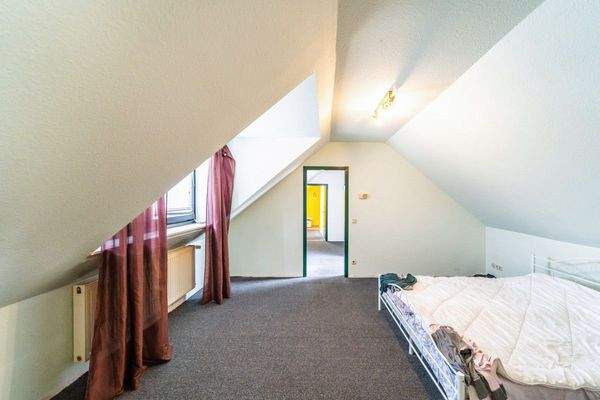 Schlafzimmer einer Dachgeschosswohnung