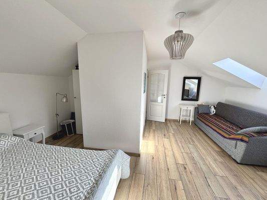 ausgebautes Zimmer im Dachgeschoss