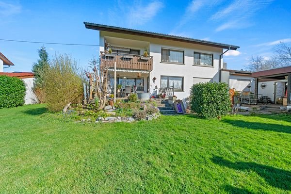 Wohn-und Geschäftshaus Außenansicht - Gartenseite