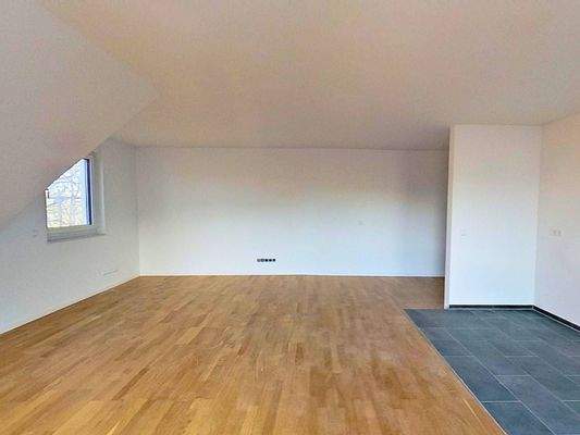 Ansicht II: Wohn- und Esszimmer mit offenem Küchenbereich