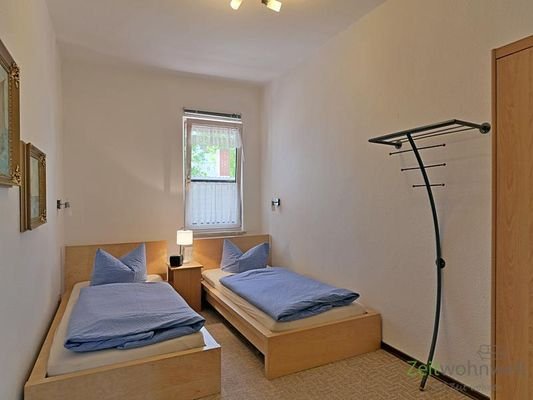 Schlafzimmer mit Kleiderschrank