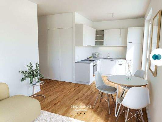 Ansicht III: Wohn- und Esszimmer mit offenem Küchenbereich