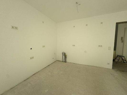 Wohnzimmer mit offener Küche Bild 3