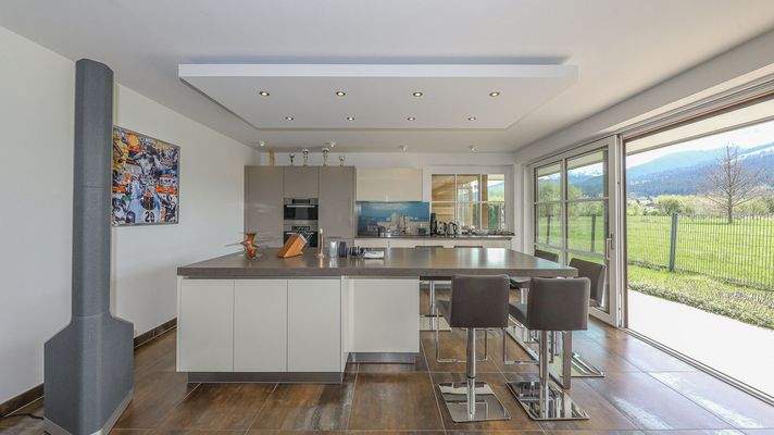 KITZIMMO-Exklusive Gartenwohnung in Toplage kaufen - Immobilien St. Johann.