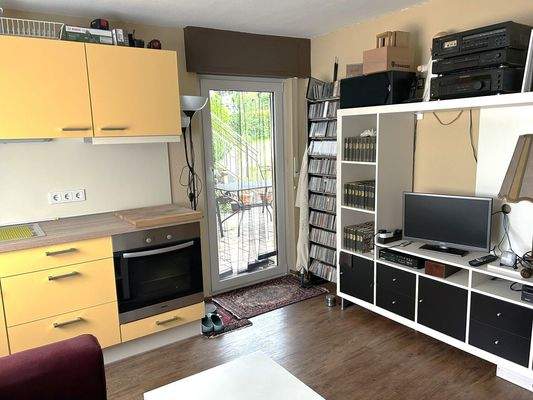 Zimmer mit Küchenzeile im Erdgeschoss