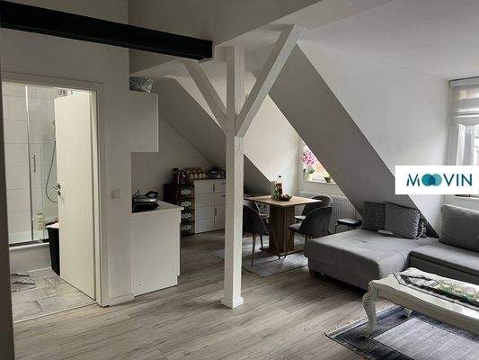 Ansicht I: Wohn- und Esszimmer mit offenem Küchenbereich