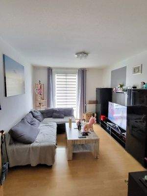 Wohnzimmer mit Balkon