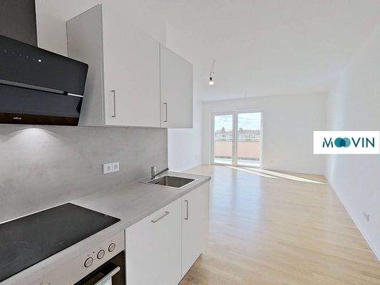 Ansicht I: Wohn- und Esszimmer mit offenem Küchenbereich