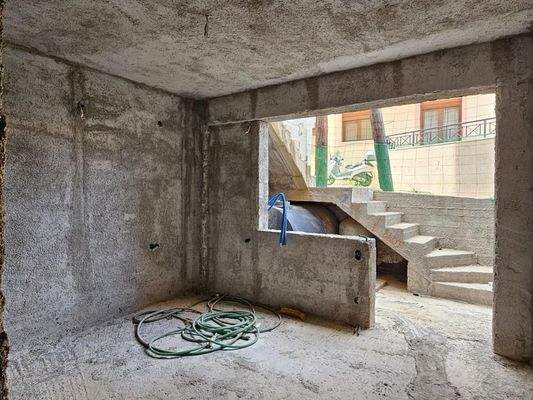 Kreta, Koutouloufari: Haus im Dorfzentrum mit großer Dachterrasse mit herrlichem Blick auf Hersonissos und das Meer zu verkaufen