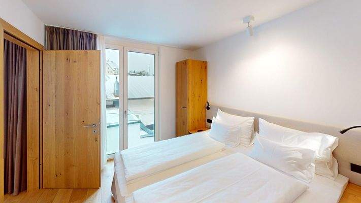 Apartment-201-ASR-FIEBERBRUNN-Bedroom.jpg