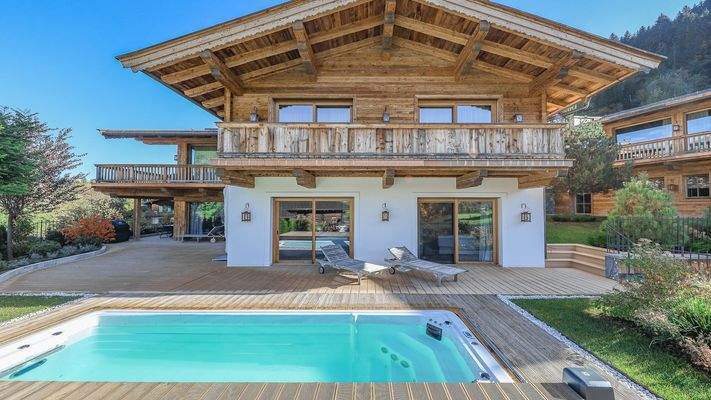 KITZIMMO-Luxuswohnung mit Pool in Toplage kaufen - Immobilie Jochberg.