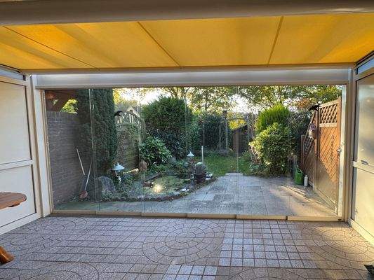 Wintergarten mit Schiebetür