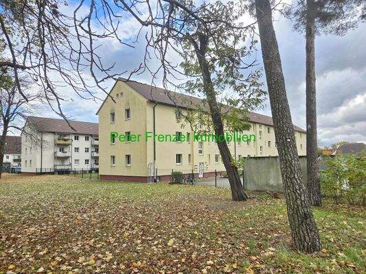  zwei Mehrfamilienhäuser