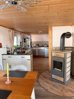 inkl. wasserführendem Holzofen