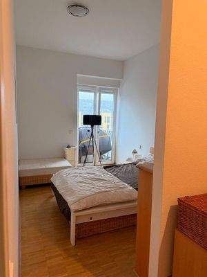 Schlafzimmer mit Balkonblick