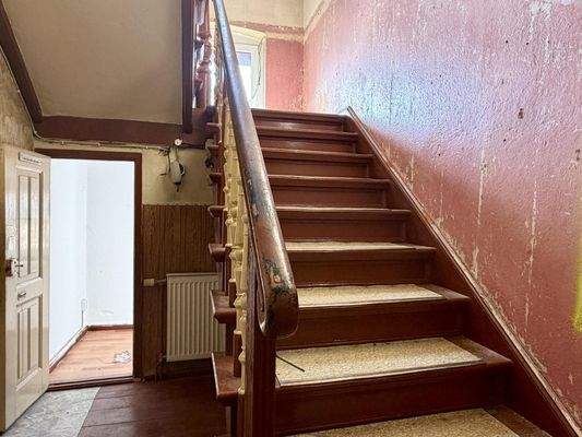 Treppe ins Obergeschoss
