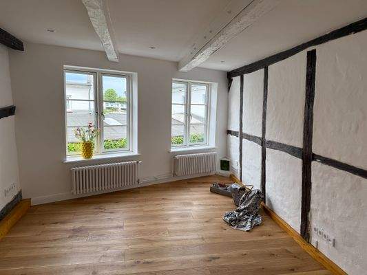 Aufwendig renovierter erster Stock mit historischem Hintergrund