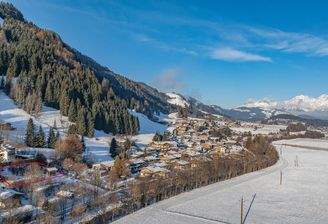 KITZIMMO-Grundstück für Einheimische in sonniger Ruhelage kaufen - Immobilien Kitzbühel.
