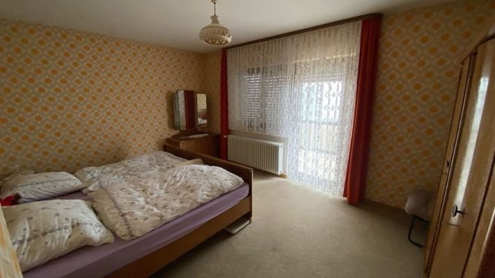 Schlafzimmer mit Balkon