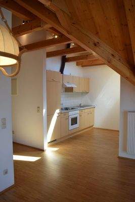 Einbauküche und Sichtdachstuhl