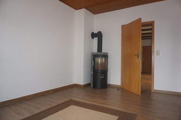 Wohnbereich mit Kaminofen im Erdgeschoss