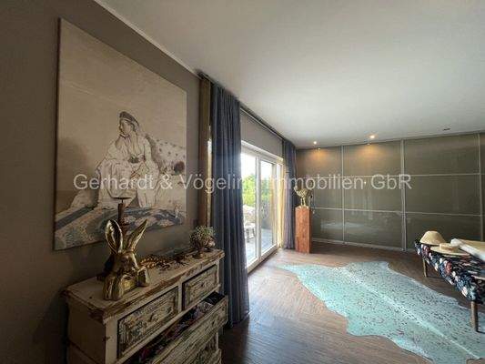 Schlafzimmer mit Zugang zu eigener Terrasse