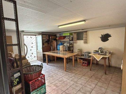 Werkstatt mit Gartenzugang im Untergeschoss