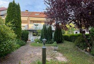 Charmantes Reihenendhaus mit Wintergarten