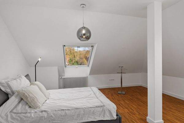 Zimmer 3 im Dachgeschoss (10,67m²)