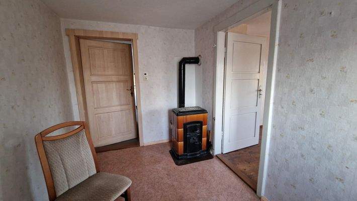 Zimmer mit Kaminofen