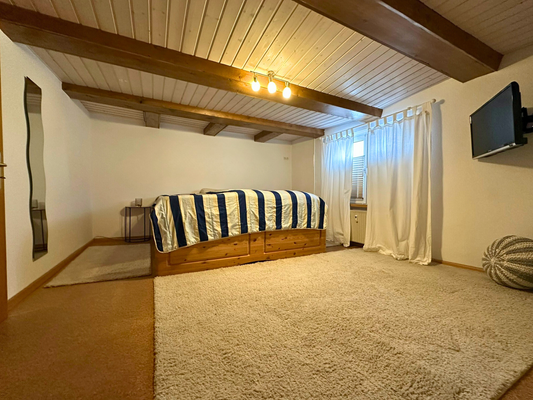 Schlafzimmer 1 Hauptwohnung Obergeschoss