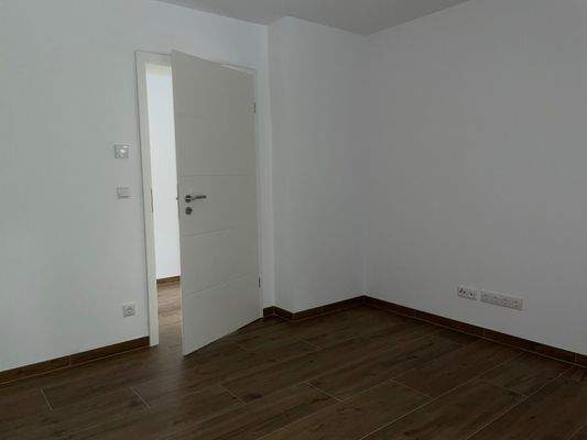 Schlafzimmer 1 + Ankleide