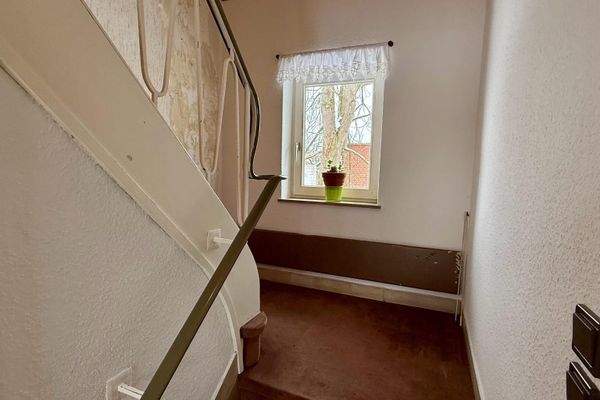 Treppenaufgang ins Dachgeschoss.