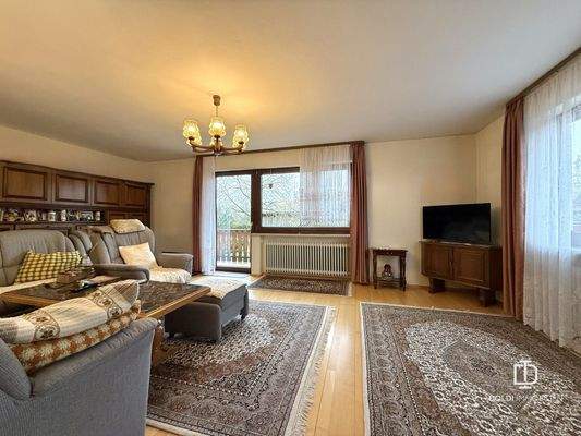 Wohnzimmer mit Zugang zur Terrasse