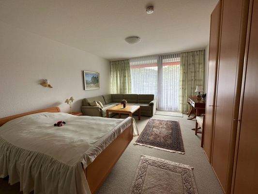 Schlafzimmer mit SItzecke