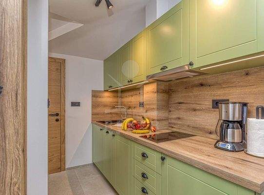 Gemütliche Schlafzimmer und voll ausgestattete Küchen