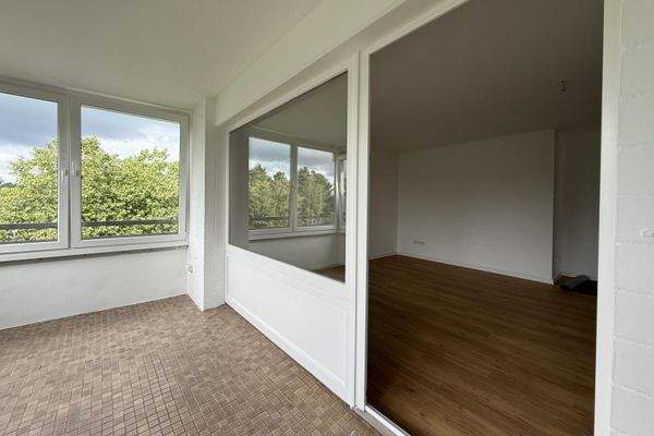 Wintergarten mit Wohnzimmer