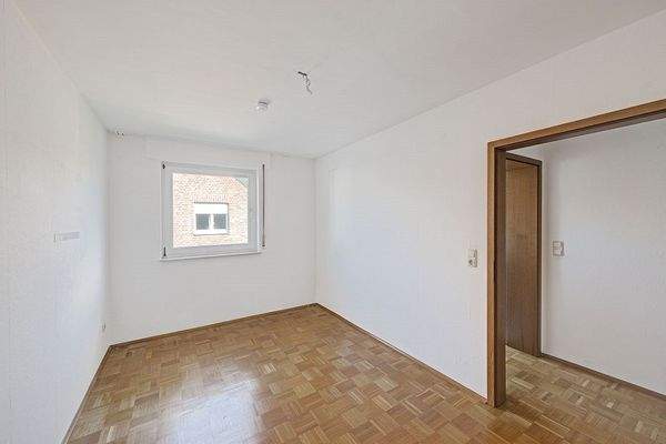 Eines der Schlafzimmer im Dachgeschoss