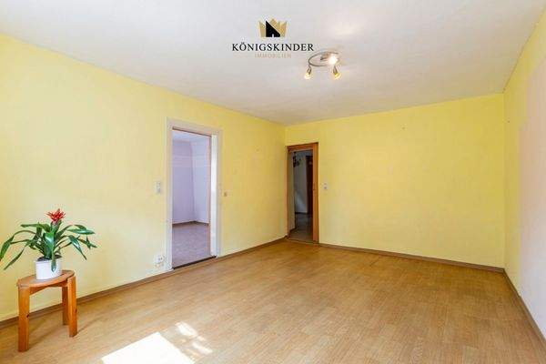 1.OG Wohnzimmer- Wärme und Gemütlichkeit: Das Herzstück des Hauses 